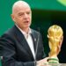 Gianni Infantino with the World Cup trophy at a pre-tournament news conference