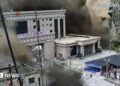 CCTV shows people running as mud and water destroys buildings in Gyirong, Tibet