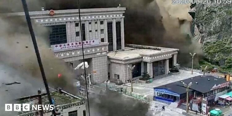 CCTV shows people running as mud and water destroys buildings in Gyirong, Tibet