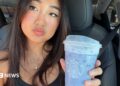 Elaine Ling holds a lavender Grande Ocean Drink from Starbucks
