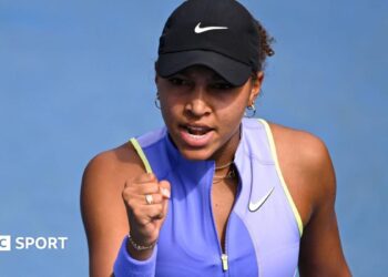 Thea Frodin celebrates winning a point at the Australian Open