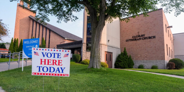 Signs greet voters as polls open in Connecticut, Minnesota, Vermont, and Wisconsin for primary elections