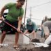 Captain Hook, Hawaii residents prepare stuff bags with sand in preparation of Tropical Storm Lala on Friday