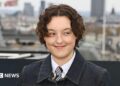 Bella Ramsey attends the HBO Max Experience London photocall at Piccadilly Lights on March 24, 2026 in London, England
