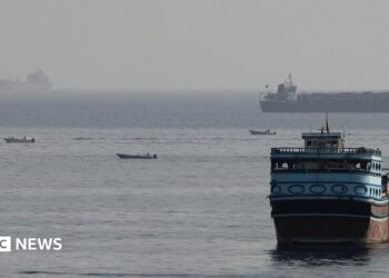 Vessels in the Strait of Hormuz, as seen from Musandam, Oman, August 3, 2026
