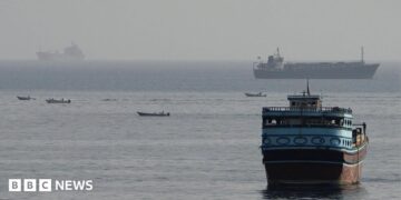Vessels in the Strait of Hormuz, as seen from Musandam, Oman, August 3, 2026