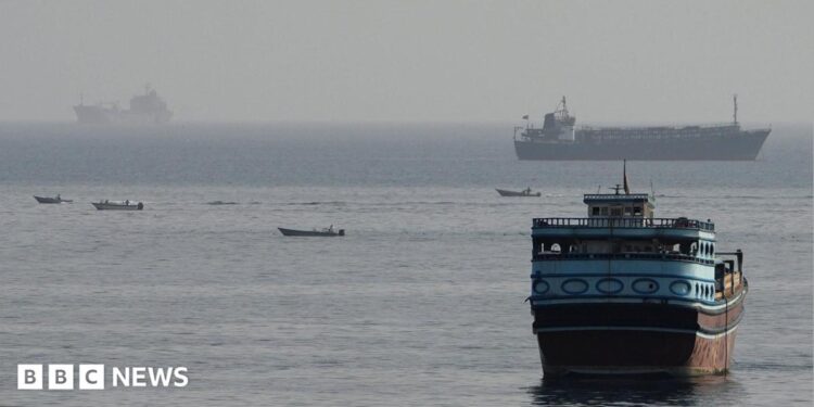 Vessels in the Strait of Hormuz, as seen from Musandam, Oman, August 3, 2026