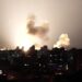 Ukraine skyline at night lit up by a missile