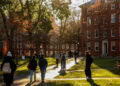 FILE PHOTO: Students walk on the Harvard campus