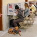 People vote at the San Francisco City Hall voting center in San Francisco