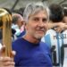 Jorge Messi holding his son Lionel Messi's trophy for best player at the 2022 World Cup after Argentina beat France in the final in Qatar