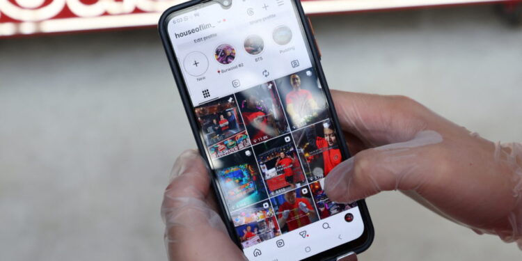 A teen social media content creator shows his Instagram in Sydney, Australia, in 2025. File photo by Hollie Adams/ Reuters