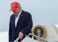 U.S. President Trump disembarks Air Force One at Joint Base Andrews