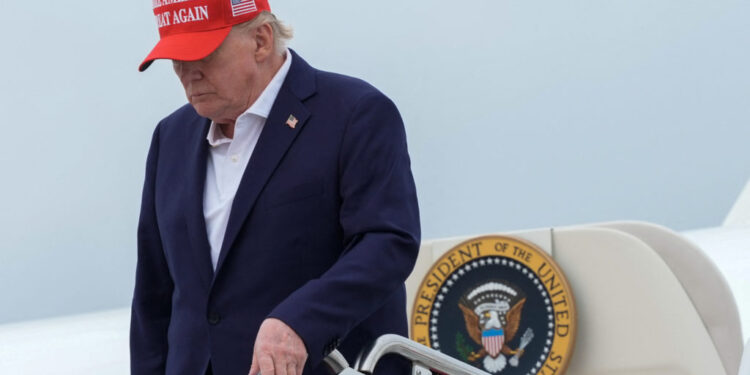 U.S. President Trump disembarks Air Force One at Joint Base Andrews
