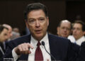 Former FBI Director James Comey testifies before a Senate Intelligence Committee hearing in Washington