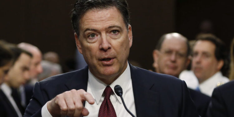 Former FBI Director James Comey testifies before a Senate Intelligence Committee hearing in Washington