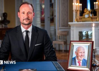Aerial photo showing festival tents and ambulances at the scene