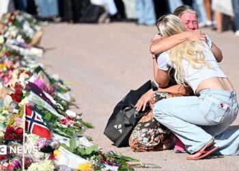 People are gathering at The Palace Square to pay their respect to King Harald V of Norway who is at Oslo University Hospital in a serious condition on August 27, 2026 in Oslo, Norway