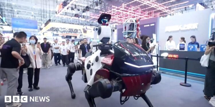 A humanoid robot riding a mechanical horse in front of onlookers