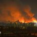 A fire breaks out following massive Russian ballistic missile strikes in the Ukrainian capital of Kyiv, with orange and black plumes of smoke expanding across the night sky.