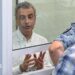 Lev Shlosberg (left, in handcuffs) attends a court hearing in Pskov, western Russia. Photo: 17 September 2026.
