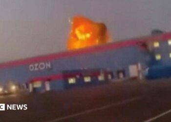 A screengrab from a video on social media showing flames rise from an Ozon facility following a Ukrainian drone strike in Makhachkala, Dagestan, Russia.