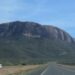 Mount Ololokwe is seen in the background of a highway