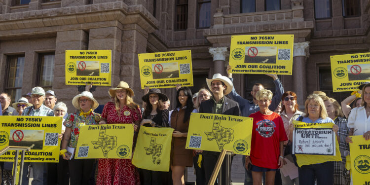 Texans rally on the Capitol steps before a House State Affairs committee hearing on data centers and 765-kV transmission lines on Wednesday, Aug. 19th, 2026.