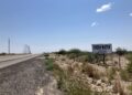 A sign on the side of the highway in the Permian Basin advertises fresh water for sale. Fracking requires significant volumes of water to complete wells.