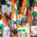 Supporters of the youth-led satirical political movement Cockroach Janta Party (CJP) celebrate the resignation of Union Education Minister Dharmendra Pradhan, in Mumbai, India