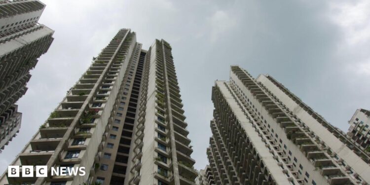 High-rise apartment buildings in Forest City seen from below