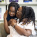 Jaleel Montgomery with his mom Mikole after a tutoring session at the Missouri City Branch Library.