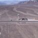 aerial shot of Nazca lines, line drawings in desert sand