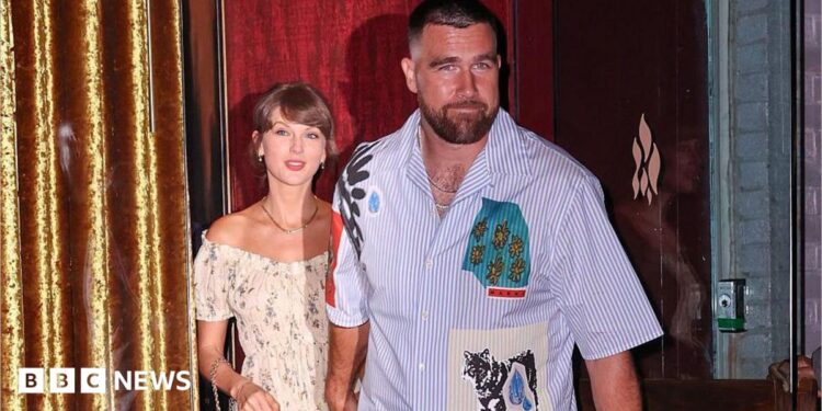 Taylor Swift and Travis Kelce were seen walking out of a restaurant on their wedding weekend in New York City. She is wearing a floral dress and he is seen in a short-sleeved button-down shirt and pants.