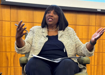 FILE PHOTO: Federal Reserve Governor Lisa Cook speaks at the Stanford Institute of Economic Policy Research in Palo Alto