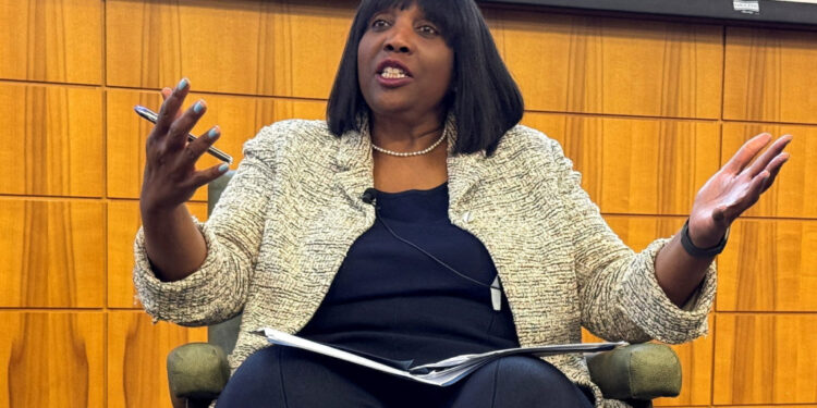 FILE PHOTO: Federal Reserve Governor Lisa Cook speaks at the Stanford Institute of Economic Policy Research in Palo Alto