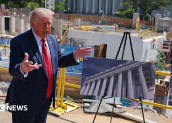 President Trump showing a rendering of the ballroom in front of construction materials on 19 May.