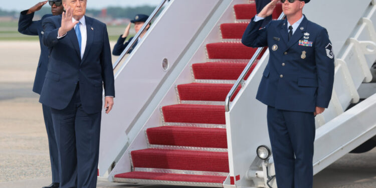 U.S. President Trump disembarks Air Force One at Joint Base Andrews