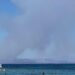 Smoke rises in Salamina during wildfire as seen from Agistri island