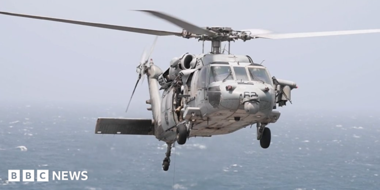 A photo of a US Navy MH-60 helicopter used by US Central Command in its post to inform about missile strikes on a cargo ship