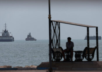 Vessels in the Strait of Hormuz are visible near the beach of Bandar Abbas
