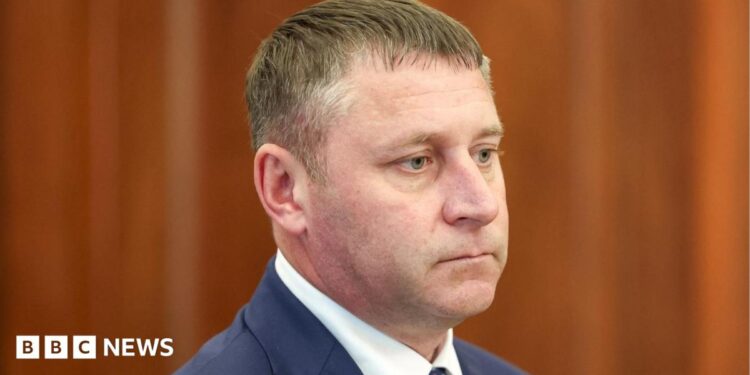 Belgorod's acting governor Alexander Shuvaev in a suit and tie earlier this month