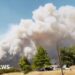 Smoke billows into the sky during a wildfire in Washington state