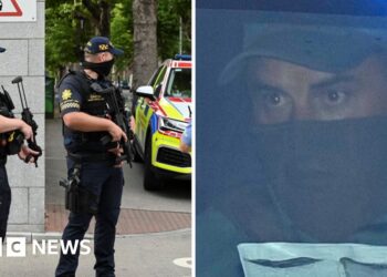 Police on left Kinahan on right