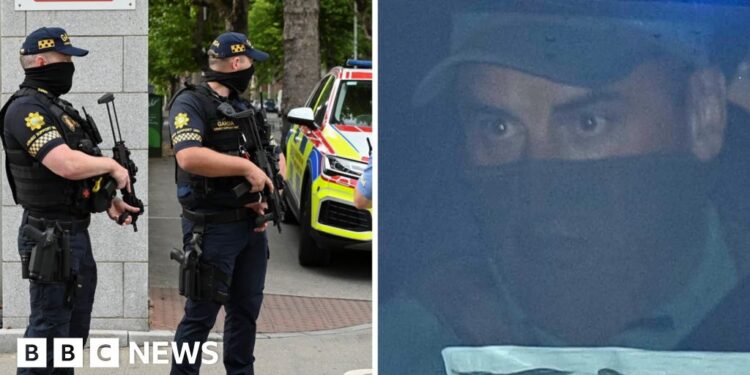 Police on left Kinahan on right
