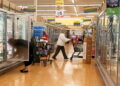 Food shoppers browse the aisles for groceries ahead of the Thanksgiving Day holiday in Redmond