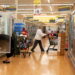 Food shoppers browse the aisles for groceries ahead of the Thanksgiving Day holiday in Redmond