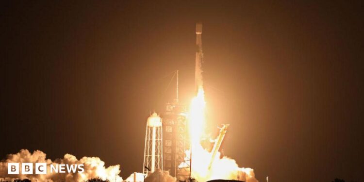 File image of a a Space X Falcon 9 rocket launching from Cape Canaveral, Florida, on 15 January 2025. Flame from the rocket are visible at the base as it hurtles into the air