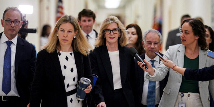 FILE PHOTO: Kathy Ruemmler, former chief legal officer at Goldman Sachs, meets with the House Oversight and Government Ref...