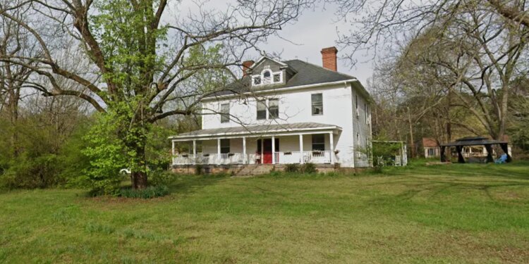 two story house with large yard